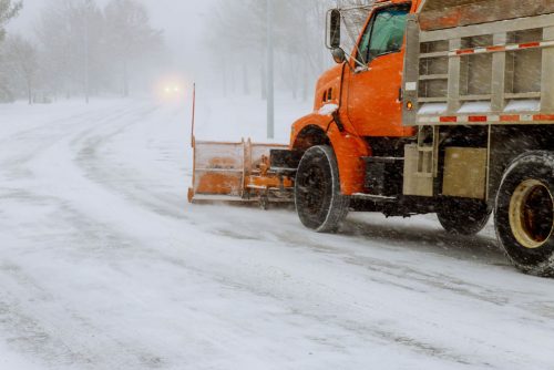 Photo of truck plowing snow